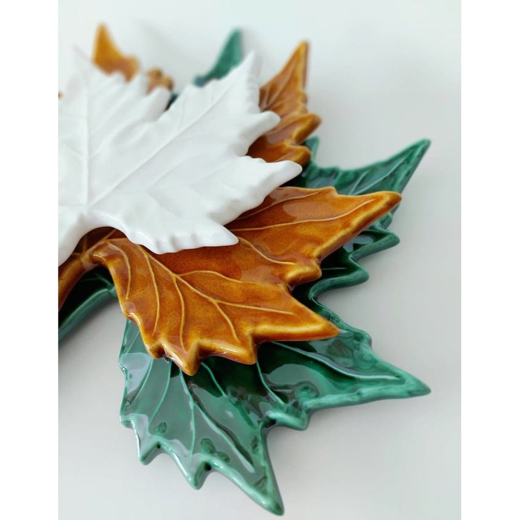 White ceramic maple leaf
